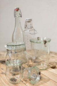 Reusable glass bottles and glass containers from the unpackaged 'Stückgut' shop, Altona, Hamburg, Germany Reusable glass bottles and glass containers from the unpackaged 'Stückgut' shop, Altona, Hamburg, Germany
